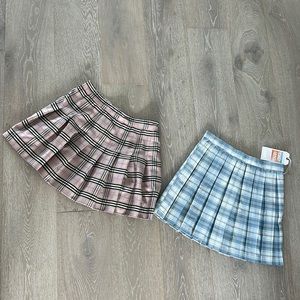 Lot of 2 pleated mini skirts size medium one NWT